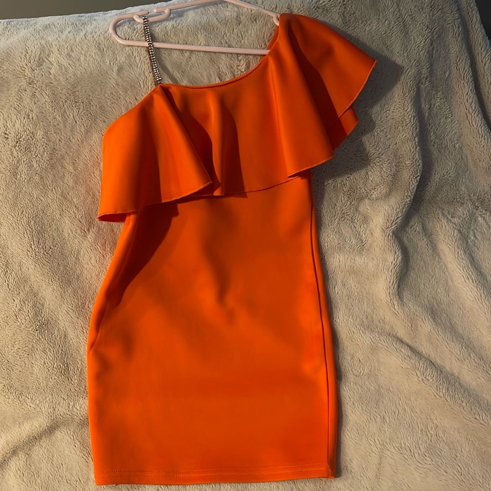 Kids beautiful one shoulder dress. Worn once.  Little small blemish on front.